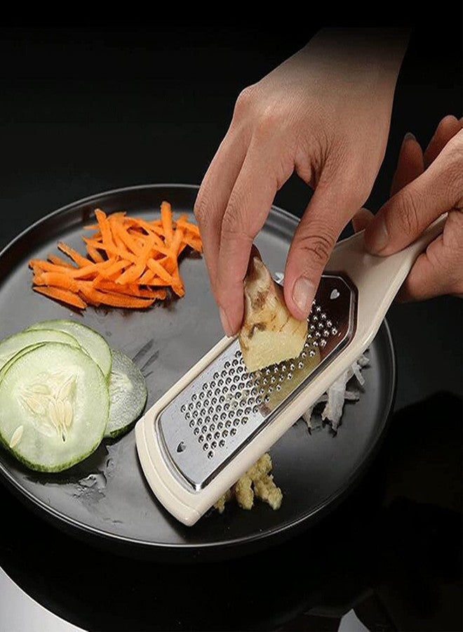 Trifecta مبشرة ومقشرة ومقطعة يدوية متعددة الاستخدامات من تريفيكتا كيتشن - 4 قطع، مصنوعة من الفولاذ المقاوم للصدأ مع فتحة للتعليق، مناسبة للخضراوات والفواكه وجوزة الطيب ومبشرة الليمون والزنجبيل والثوم. - Image 2